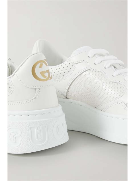 gucci chunky b perforated sneakers.